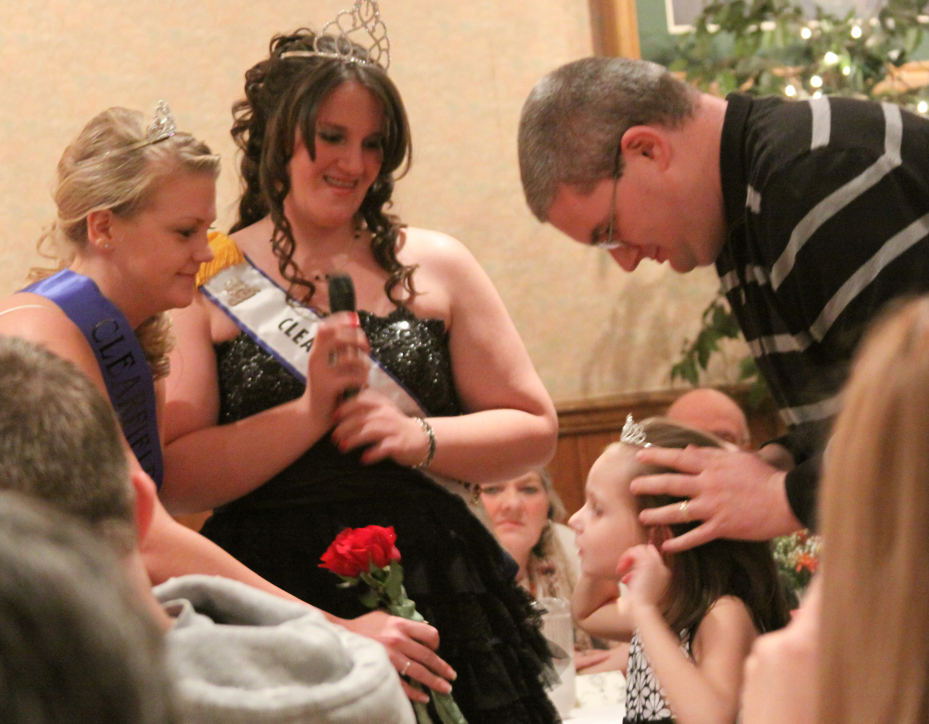 Halee Kephart, current fair queen, and the Queen's Court crown Leah as the 2010 Honorary Princess. (Steven McDole)