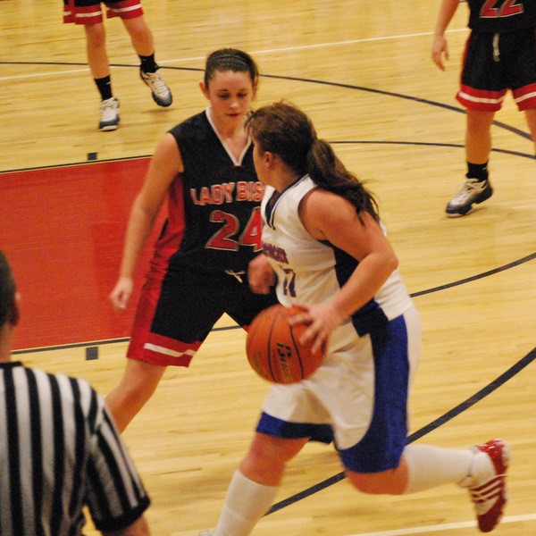 Rachel Thompson, here playing defense, led the Lady Bisons with 18 points (Photo courtesy ladybisonsports.org)