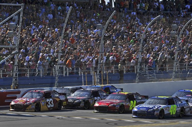 A four-wide photo finish showed Jimmie Johnson barely edging Clint Bowyer for the win at Talladega on Sunday.