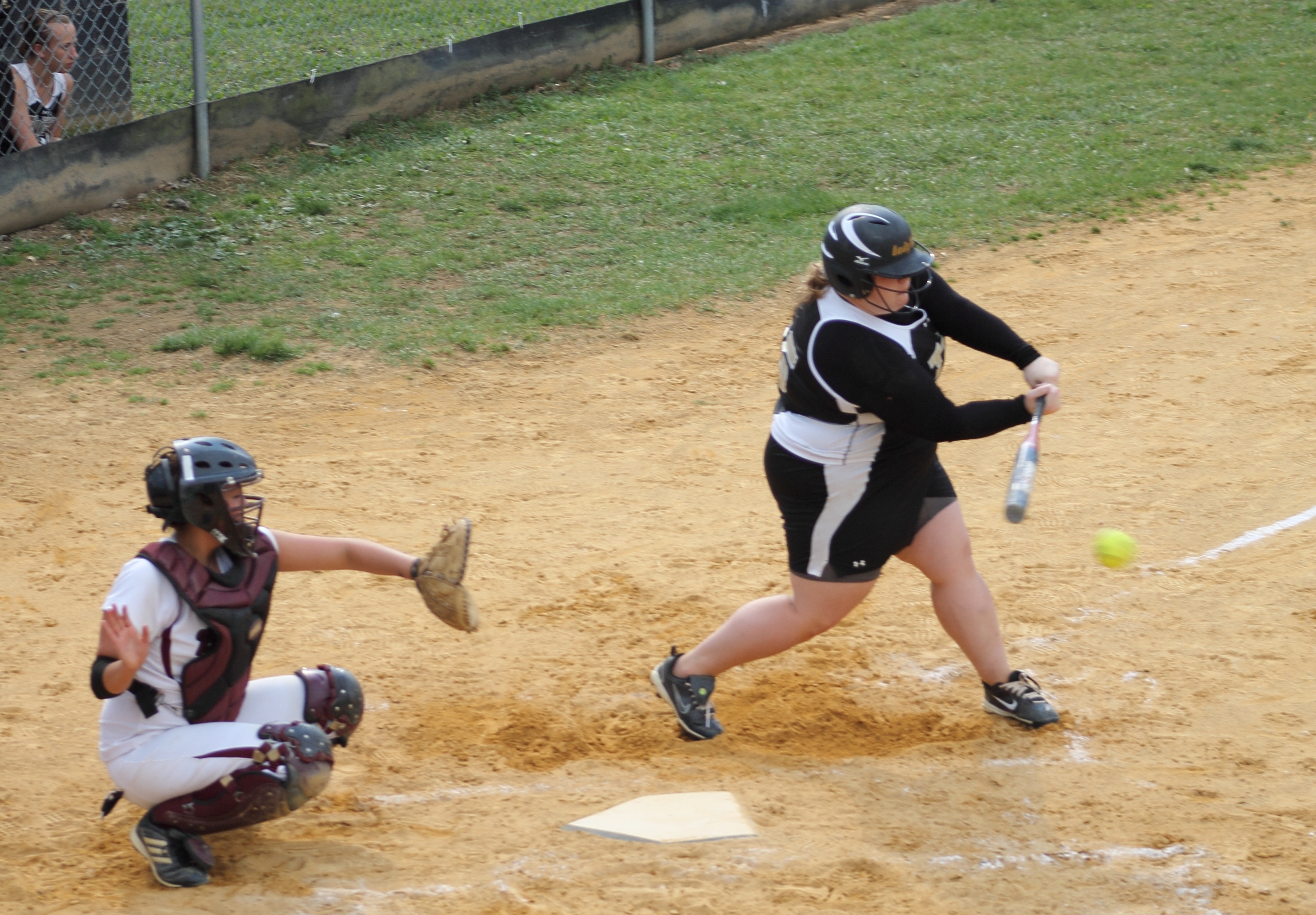 Curwensville third-basemen Molley Demchak rips one of her three hits yesterday against Ridgway.  Demchak was 3-for-4 with 2 RBI to help lead the Lady Tide to an 11-2 vicory.  (photo by Rusty Mccracken)