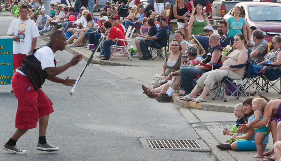 A member of the Yadco music group from North Versailles, Pa delights a few children with his performance.