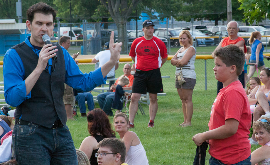 Larry works through the crowd picking volunteers to randomly pick marbles.