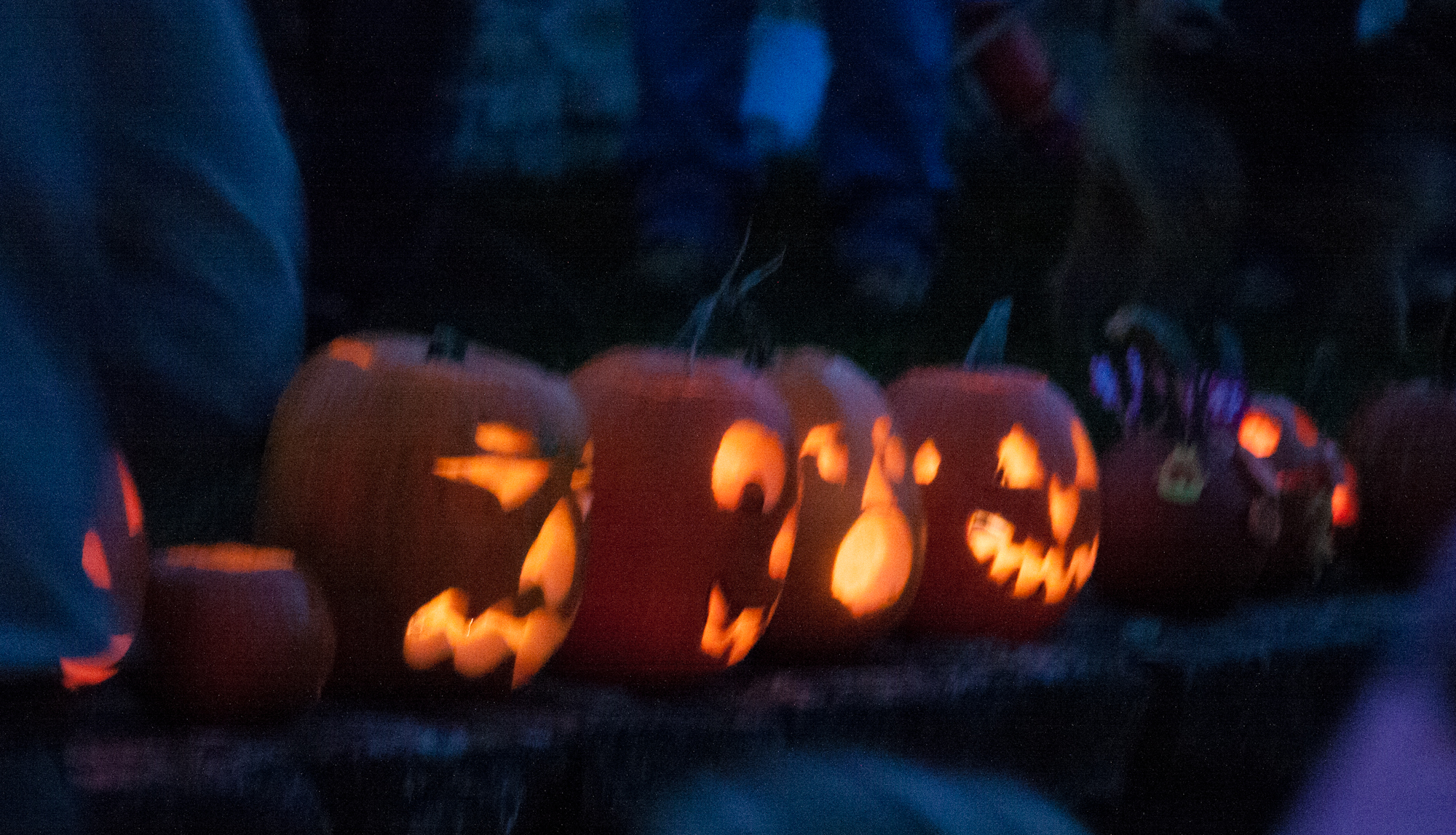 Lit pumpkins lined the wall before being carried to the raft.
