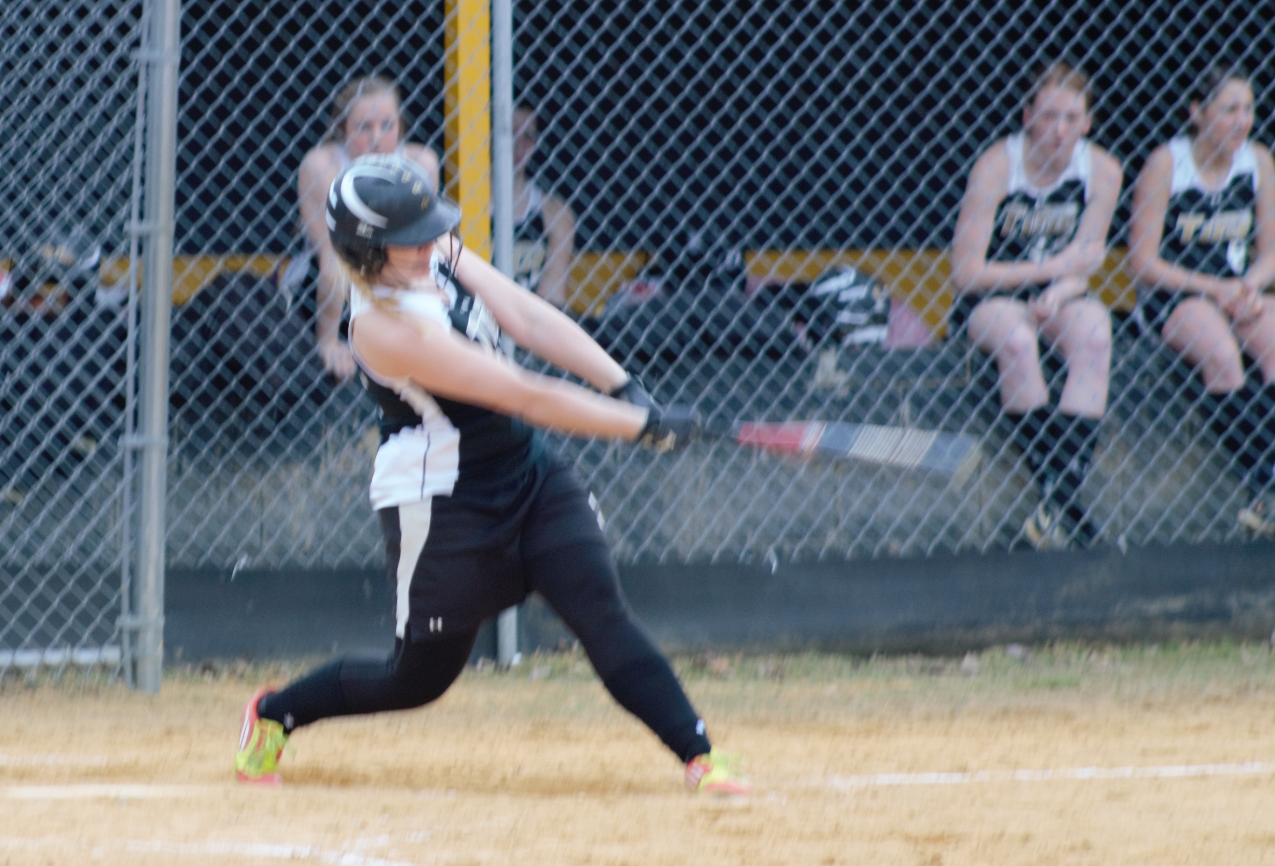 TIFFANY CARTER shows her swing earlier this season.  Carter belted a three-run homer yesterday to help lift the Lady Tide to a 5-0 win over Ridgway