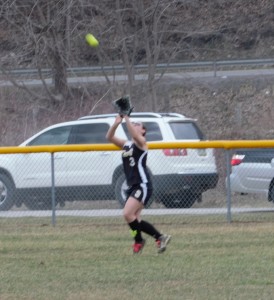 Curwensville senior leftfielder Abby Johnson settles under a fly ball against Kane on Monday.  Kane out-dualed the Lady Tide 12-11 in nine innings.