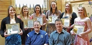 Pictured standing are Penn State DuBois Women's Basketball Players with their academic awards.  From left to right are Jordan Fairman, Karlee Cyphert, Karly Carnovale, Kiley Lewis, Patience McCullough, and Linsey Mizic.  Seated are Coach Pat Lewis, left, and Athletic Coordinator Ken Nellis. (Provided photo)