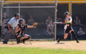 EYE ON THE BALL - Curwensville's Abby Johnson is set to connect on one of her three hits in an 11-2 win over Moshannon Valley on Friday. 