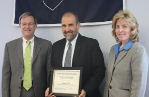 Bob Johnson, DEF secretary, presents Rob Loeb, associate professor of biology and forestry, with the DEF Educator of the Year Award.  Pictured, left to right, are Johnson, Loeb, and Penn State DuBois Chancellor Melanie Hatch. (Provided photo)