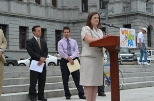 Jen Ebersole, Pennsylvania government relations director for the American Heart Association, speaks at the Walk and Ride PA rally for comprehensive transportation funding. (Provided photo)