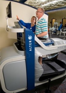 Elite Orthopedics patient Larry Baker of Altoona works out on the AlterG Treadmill with Jennifer Shawver, physical therapy assistant, at Physical Medicine & Rehabilitation's outpatient facility at the Station Medical Center. (Provided photo)