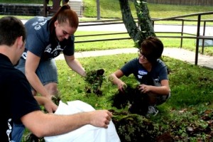 From left, students James Best, Crystal Foster and Molly Stoltz work clean up the landscaping around the Boy Scouts of America's Bucktail Council Office in DuBois. (Provided photo) 