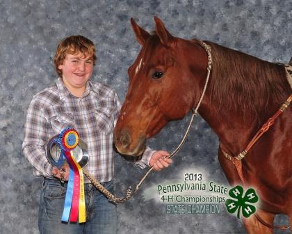 In the winner’s circle, 13-year-old Bradion Frantz of Luthersburg is all smiles after receiving first place in Raised Box Keyhole Ponies with his pony, Tatiana Sasha. (Provided photo)