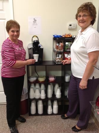 Peggy Cawthern (left), president of Friends, and Vicki Baughman, gift shop manager/buyer, at the coffee area of the new gift shop at the Station Medical Center. (Provided photo)