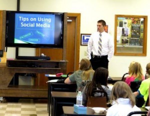 Officer Zayne Rhed of the Brockway Municipal Police Department speaks to local Girl Scouts regarding social networking and internet safety. The workshop was sponsored by DuBois Business College. (Provided photo)