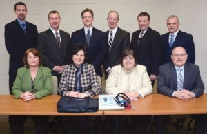 At the presentation were (from left): seated - Cathy Harlow of Tyrone Area, Linda K. Smith of Williamsburg Community, Royce Boyd of Claysburg-Kimmel and G. Brian Toth, DEd, of Bellwood-Antis; standing - Robert Gildea, DEd, of Hollidaysburg Area, Thomas Otto, DEd, of Altoona Area; Jerry Murray, president, UPMC Altoona; Bruce Erb, senior vice president, First National Bank & Trust Group; Tim Balconi, foundation president, and Robert Vadella, PhD, of Spring Cove. (Provided photo) 