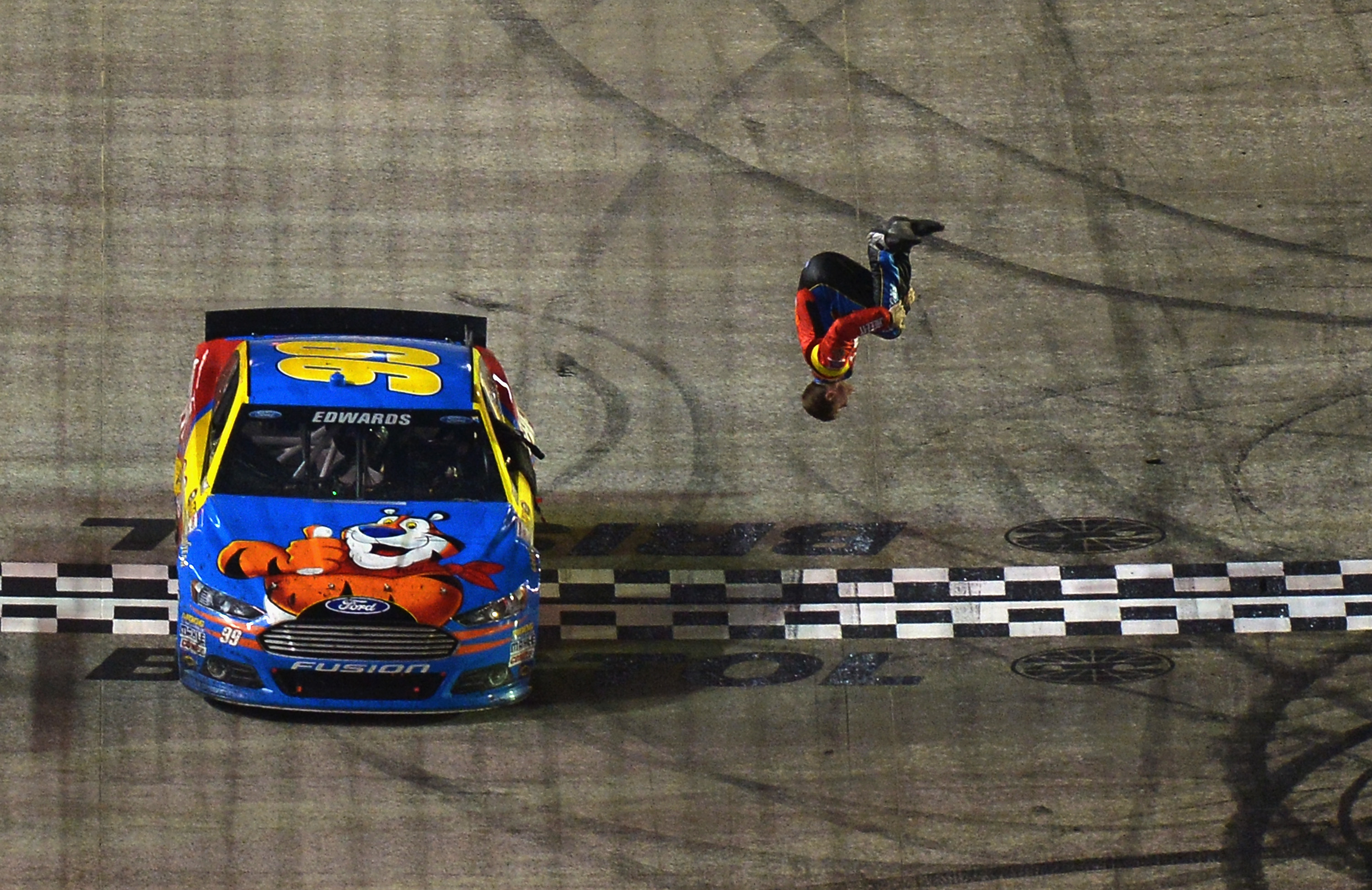 Another marathon of a night in racing saw Carl Edwards flipping out in the end.