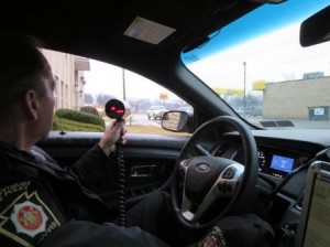 A Pennsylvania State Police trooper uses radar to determine the speed of vehicles traveling on Route 153 (Second Street) in Clearfield. The operation was a joint effort between the state police and Clearfield Borough police. (Provided photo)