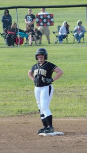 Lady Tide senior Bethany Carns shows a smile to her teammates after breaking up a Moniteau no-hitter in the District IX Class AA semifinal game on Thursday.  Curwensville's season came to an end with a 4-0 loss to the Warriors.  (photo by Rusty McCracken) 