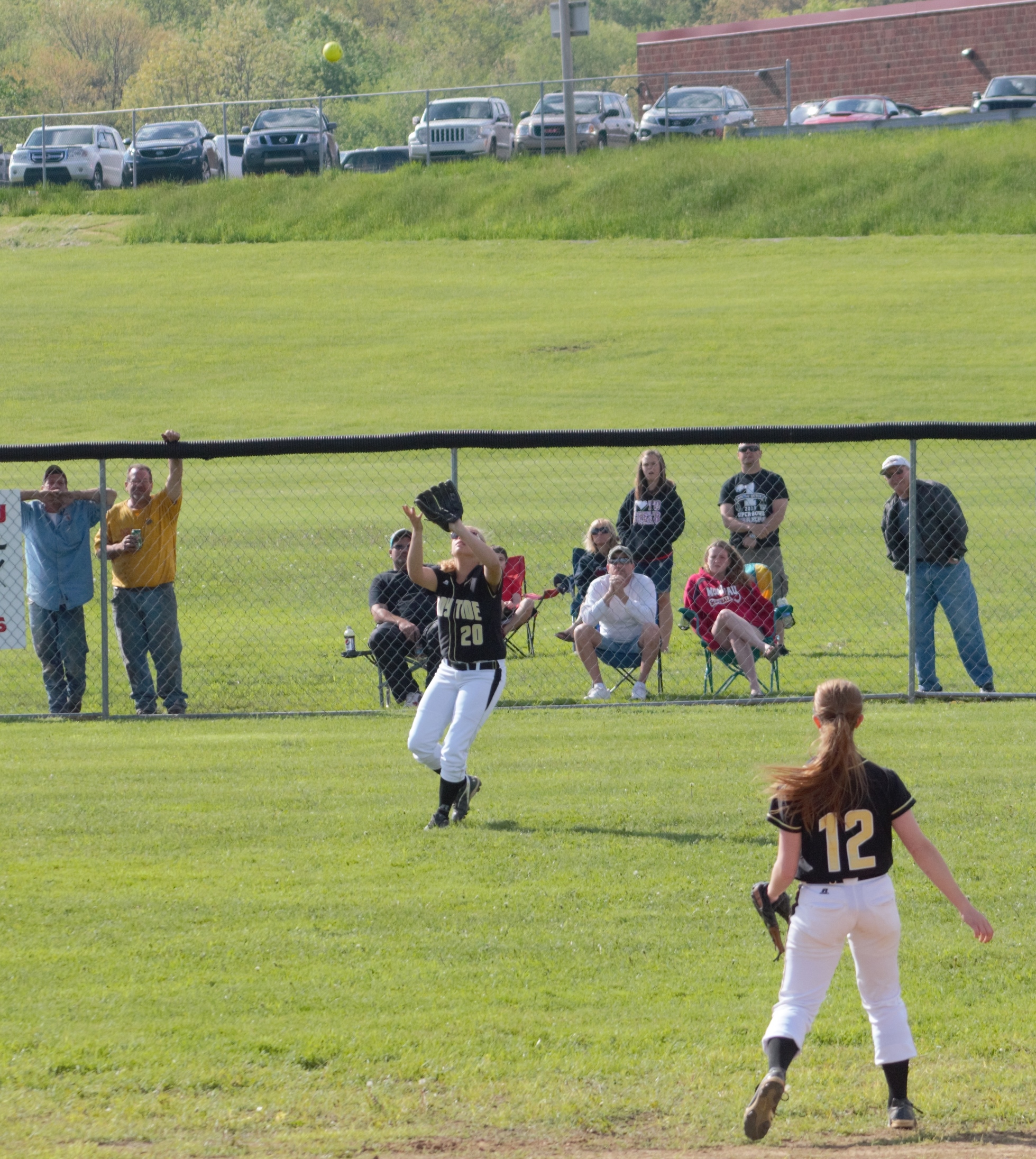 Curwensville left-fielder Megan McCartney draws a bead on a pop fly in Thursday's 4-0 loss to Moniteau.  (photo by Rusty McCracken)
