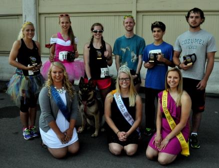 Pictured are the male and female overall race winners with Goodman and her court. In front from left are Chelsea Folmar, first runner-up; Goodman; and Lyndsey Good, second runner-up. In the back from left are Jamie Corbin; Cassie Folmar; Vanessa Snyder; Michael Robinson; Rudy Cordon; and Cody Luchs.
(Provided photo)
