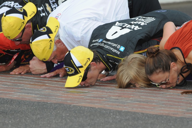 It may be the most gritty, worst smelling, and nastiest kiss to plant, but kissing the bricks at Indianapolis is one that only a select few have experienced.