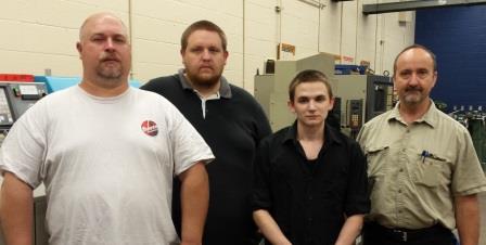 Pictured, from left, are graduates Tyler Dillon, Scott Good and Cody Mills with Instructor Bruce Smith. (Provided photo)