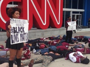 A peaceful protest gathers in front of the CNN Center in Atlanta Georgia, December 4, 2014. (CNN)