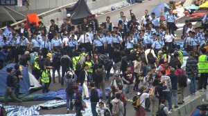 The main site of Hong Kong's pro-democracy protests was taken apart piece by piece Thursday, Dec 11, 2014, ushering in the end of an extraordinary occupation that deepened political fault lines over China's role in the city's government. (CNN)