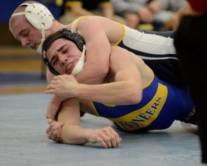 Nolan Barger controls Alfred State's George VanValen in 8-2 win. (Photo courtesy of Lycoming College Athletic Department) 
