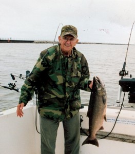 Always an avid outdoorsman, Robert Grimminger shows off his latest catch. His son Bob recalls that as long as his father's feet were in Clearfield County, he was happy (photo submitted by family)