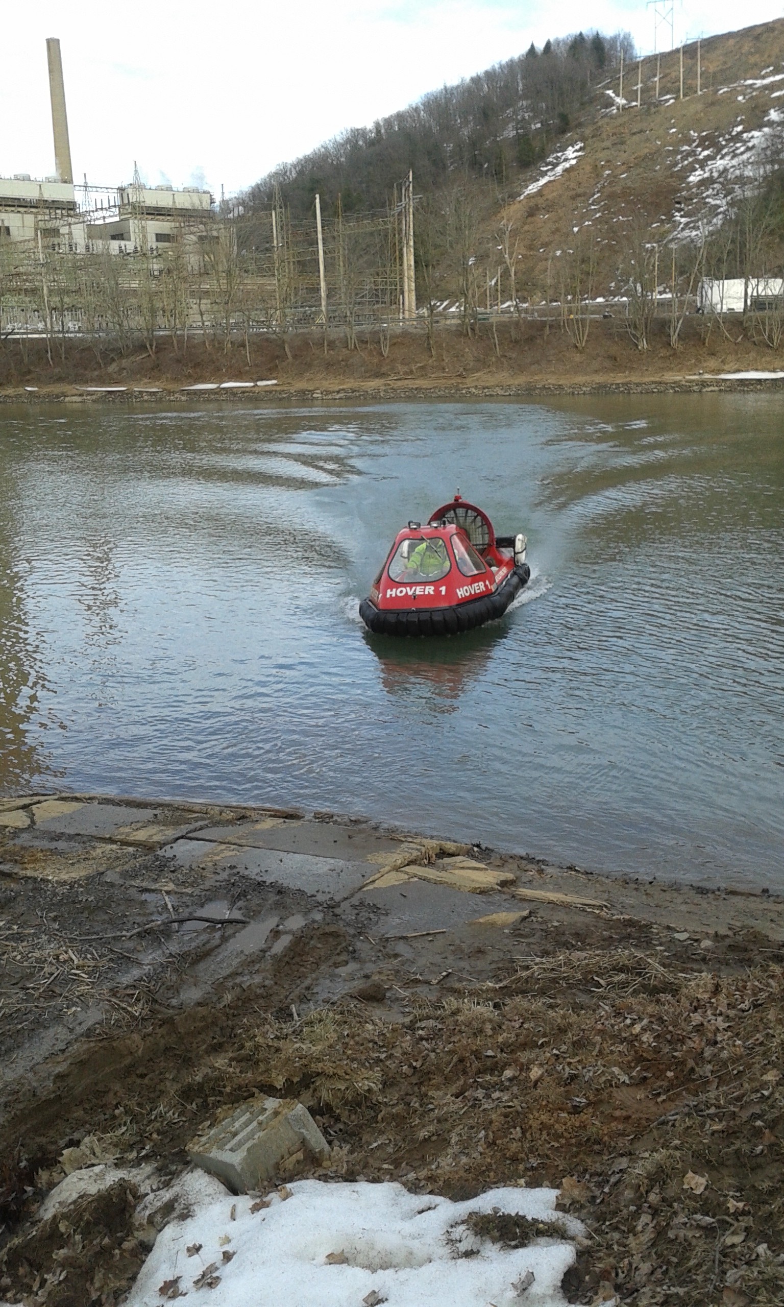 Hover 1 prepares to dock along the West Branch of the Susquehanna River Sunday following the continued search for Clearfield resident James Coons, who went missing March 12. Thick ice and extremely high water conditions made it impossible for boats and dog teams to search the river until recently. (Photo by Kimberly Finnigan)