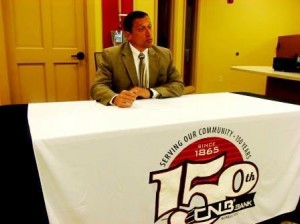 CNB Bank will continue to celebrate its 150th anniversary with its community by hosting a country concert, announced Joseph B. Bower Jr., the bank’s president and chief executive officer, at a press conference Monday. (Photo by Jessica Shirey)