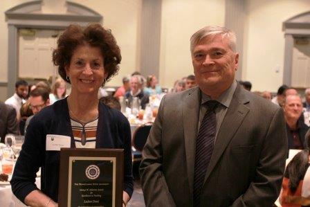 Senior Instructor in the Occupational Therapy Assistant Program Luann Demi received her award from Penn State President Eric Barron. (Provided photo)