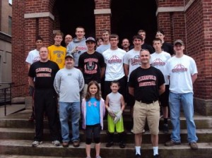 In Row 1, from left, are: Hannah Glunt and Coach Nate Glunt. In the Row 2 are: Coach Erik Brown, Coach Lew Duttry, Elijah Glunt and Coach Jason Bowman. In Row 3 are: Reese Wilson, Will Myers, Tommy Hazel and Evan Brown. In Row 4: are Taye Lynch, Caleb Strouse, Cody Spaid, David McKenzie, Micah Heichal and Carter Wood. In Row 5 are: Coach Donnie Shimmel, Corey Shimmel and Tom Hazel. (Provided photo)