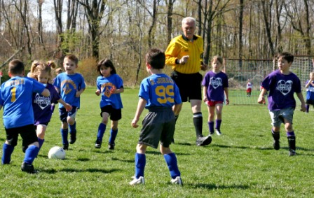 CSA Pee Wee Soccer game with referee Dwight “Skip” Koerber. Koerber, who passed away June 7, 2015, was well-known in the community through his genuine passion for the sport of soccer and his devotion to the Clearfield Soccer program over the past thirty years. Koerber was a partner Coordinator of the CSA Capital Improvement Campaign, and inspirational in getting the modernization project off the ground. (Provided Photo).