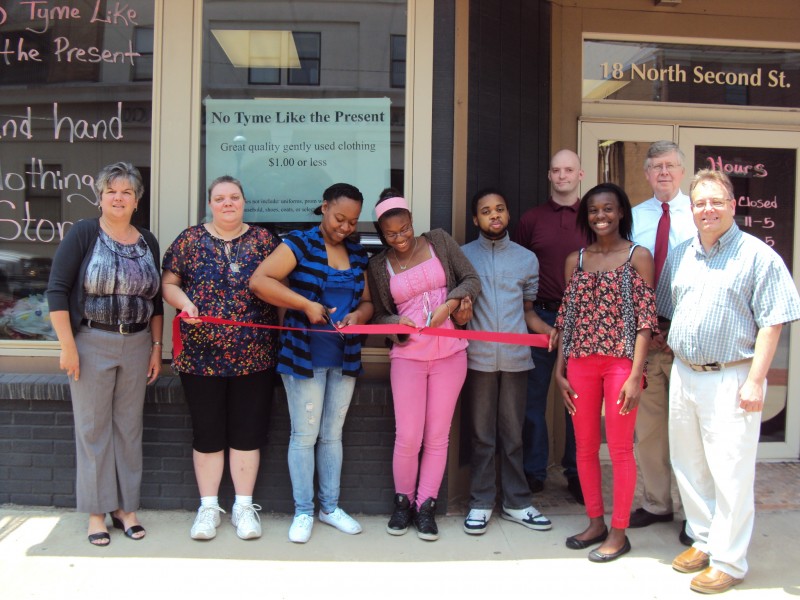 (Provided Photo)Left to right is: Main Street Manager, Loretta Wagner (CRC), Cindy Poole, Owner Elaine Newkirk, Shante Newkirk, Jaire Newkirk, , Dominique Newkirk, and Commissioner Mark McCracken.  Second Row: Shawn McCully, and Commissioner John Sobel.  