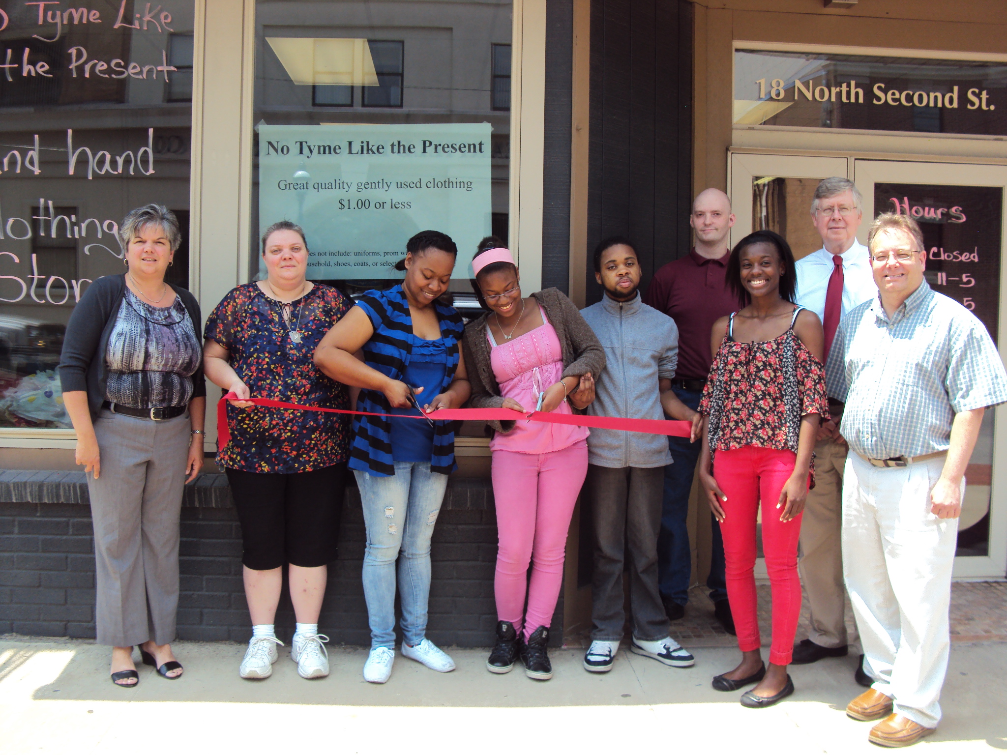 (Provided Photo)Left to right is: Main Street Manager, Loretta Wagner (CRC), Cindy Poole, Owner Elaine Newkirk, Shante Newkirk, Jaire Newkirk, , Dominique Newkirk, and Commissioner Mark McCracken. 
Second Row: Shawn McCully, and Commissioner John Sobel.