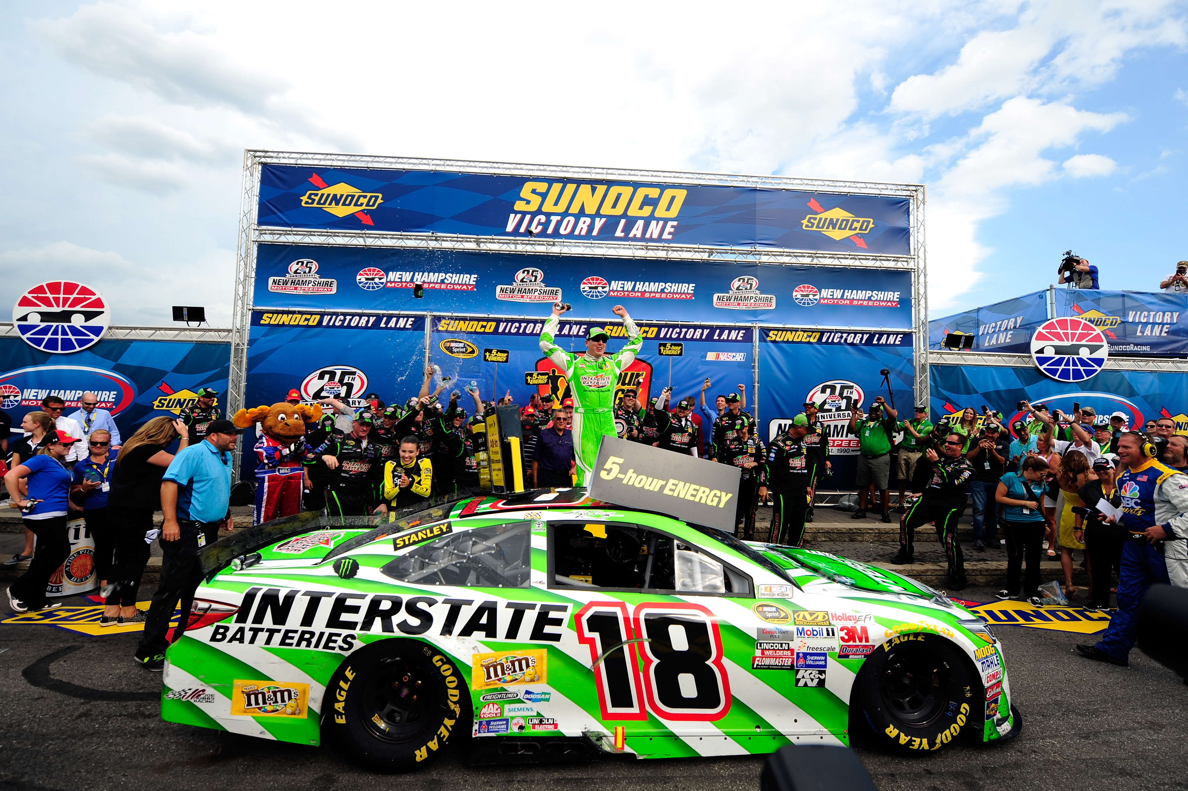 LOUDON, NH - JULY 19:  Kyle Busch, driver of the #18 Interstate Batteries Toyota, celebrates in Victory Lane after winning the NASCAR Sprint Cup Series 5-Hour ENERGY 301 at New Hampshire Motor Speedway on July 19, 2015 in Loudon, New Hampshire.  (Photo by Jeff Curry/Getty Images) *** Local Caption *** Kyle Busch