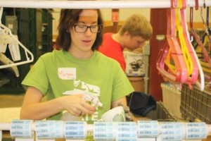 Freshman Morgan Young, of Clearfield, cleans and labels items for sale in Goodwill stores during her service experience at Goodwill Industries of North Central Pennsylvania. (Provided photo)