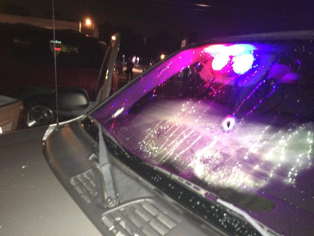 Two St. Louis County Police Department vehicles were damaged by gunfire in the early hours of August 10, 2015, police said. This photo details some of the damage from those gunshots.