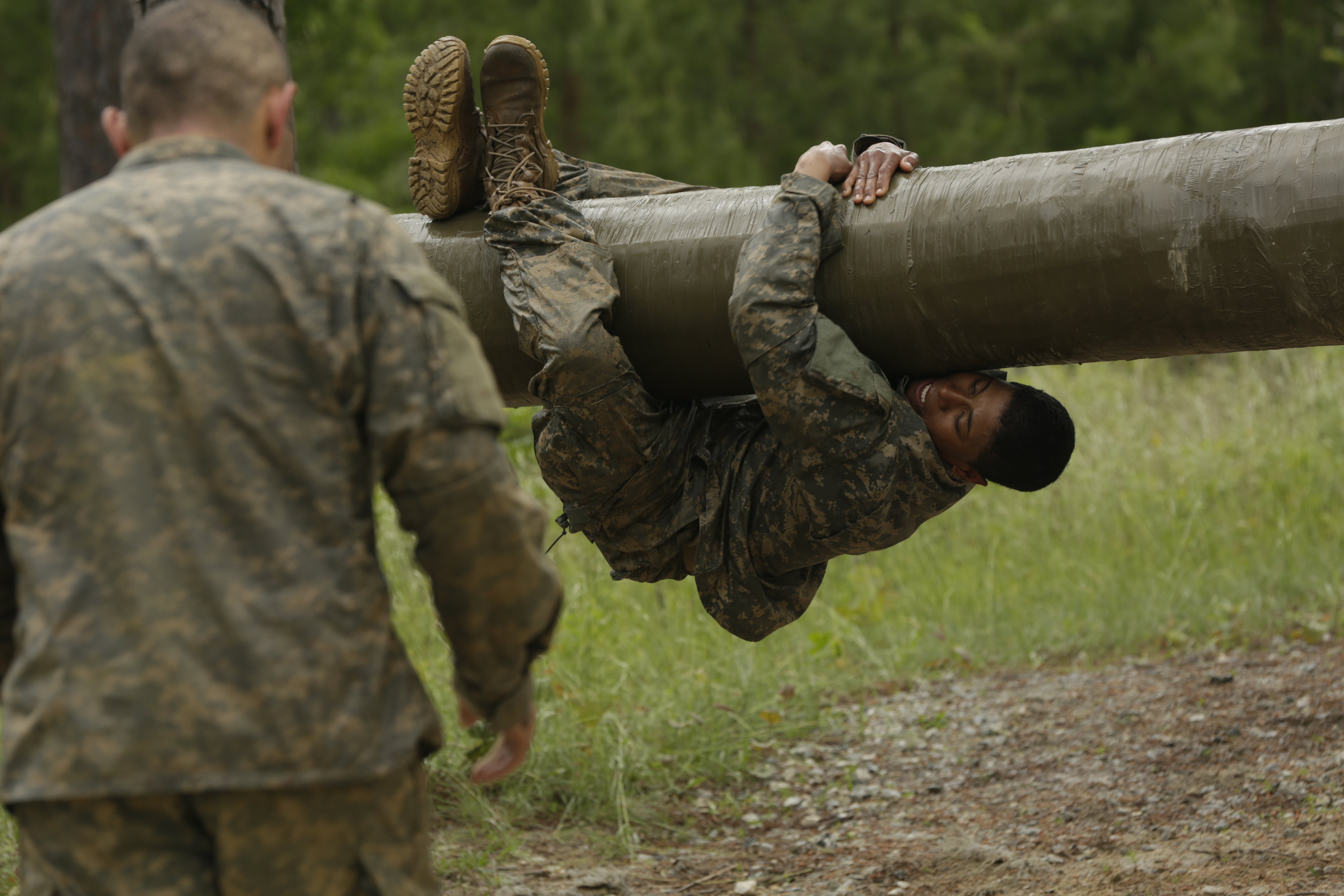 Army Soldiers participate in the Darby Queen obstacle course as part of their training at the Ranger Course on Ft. Benning Ga., June 28, 2015