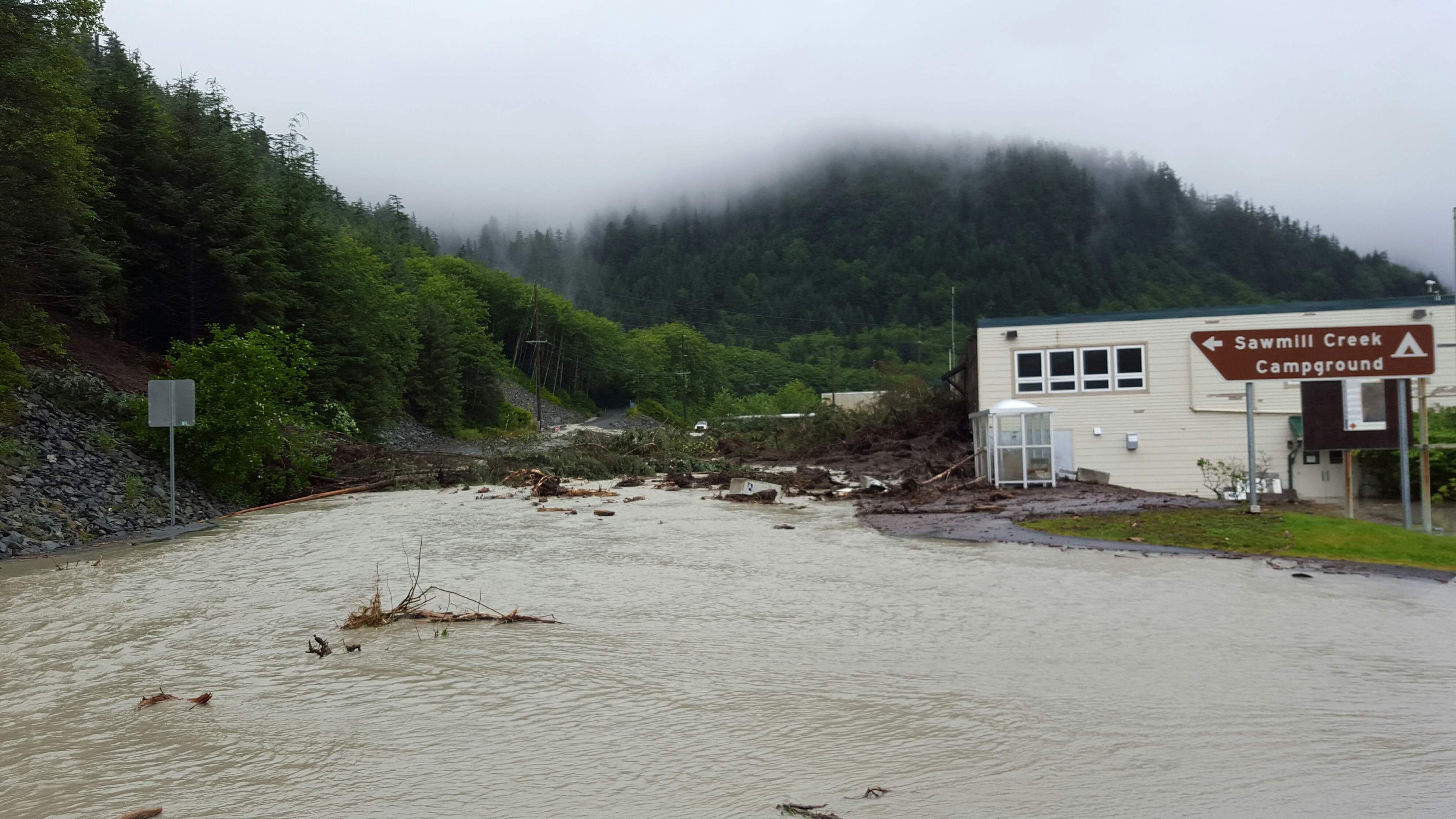 Three people were unaccounted for Tuesday, August 18, 2015, after a landslide struck a new-home development outside a city in the Alaska panhandle, authorities said. An employee of the city of Sitka and three contractors were working in the housing development when heavy rains caused the landslide, police Chief Sheldon Schmitt said.