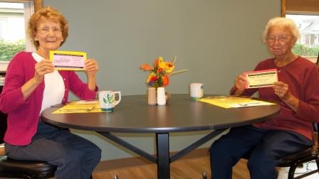 Clearfield Center for Active Living volunteers, Linda Rhone and Effie Merritt, are ready for the fall Dining Out Club, which begins this month. (Provided photo)