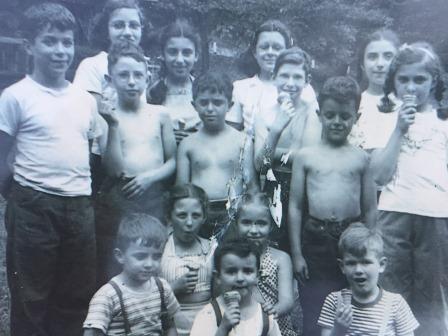 Children from the summer day camp of Sons of Israel congregation in Philipsburg enjoy their ice cream cones outside the concession at Black Moshannon State Park, c. 1946.  In the first row are: Elliot Stein, Sidney Garfinkle and Albert Berger.  In the second row are: Miss Getz and Annette Honick.  In the third row are: Arthur Stein, Rob Parsky, Bill Jaffe, Jerry Garfinkle, Abie Isenberg and Elaine Navasky.  In the fourth row are: Charlotte Parsky, Shirley Solomon, Anita Isenberg and Carolyn Stein. (Provided photo)