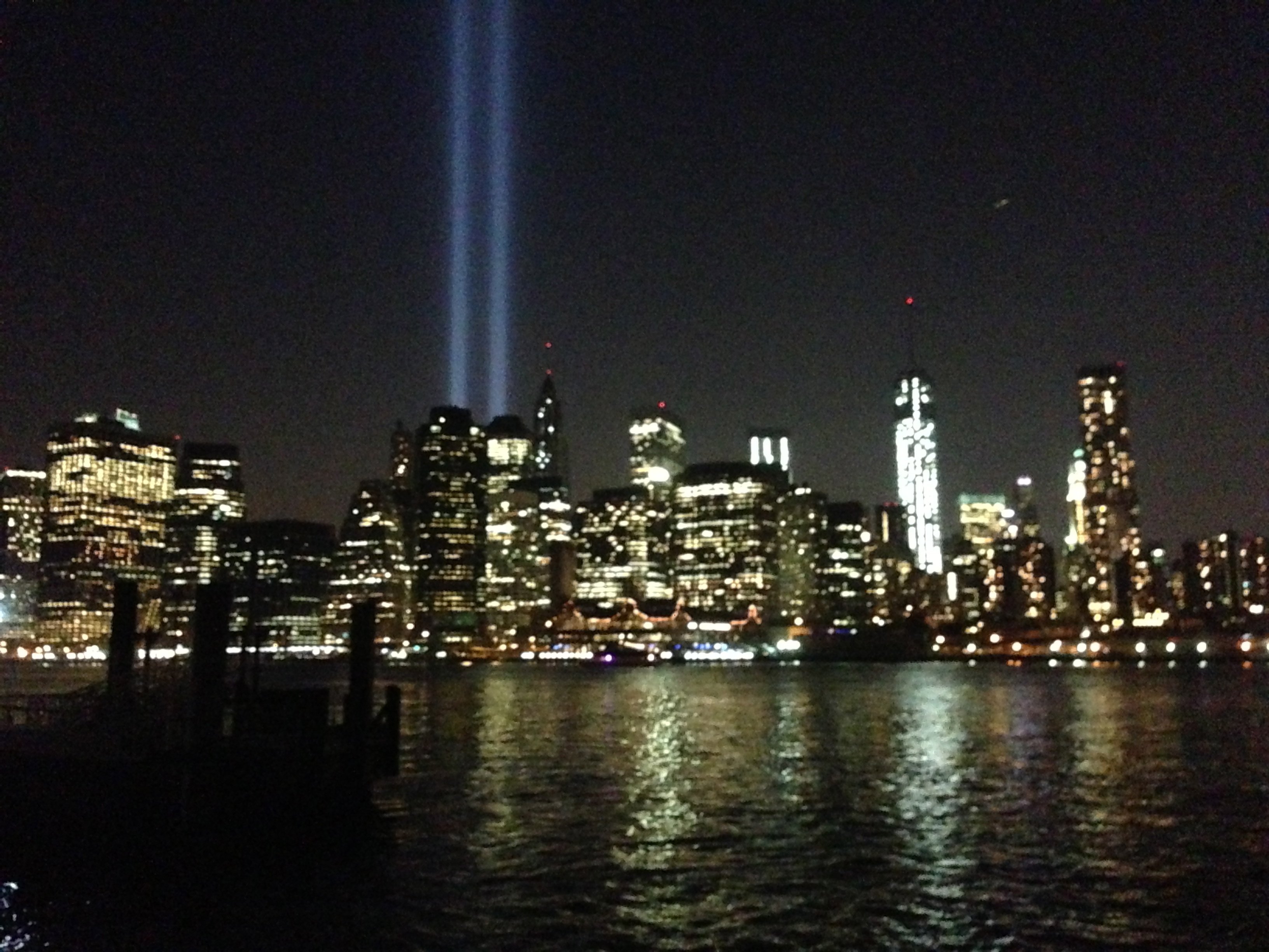 The "Tribute in Light" will return for one night as a tribute to all those who were lost on September 11th. 

The lights are located at West and Morris Streets in lower Manhattan. The lights will be on beginning at sunset on September 11, 2013 and fading away at dawn on September 12th. There will be no formal program. 

The beams of light are tested the night before September 11th.