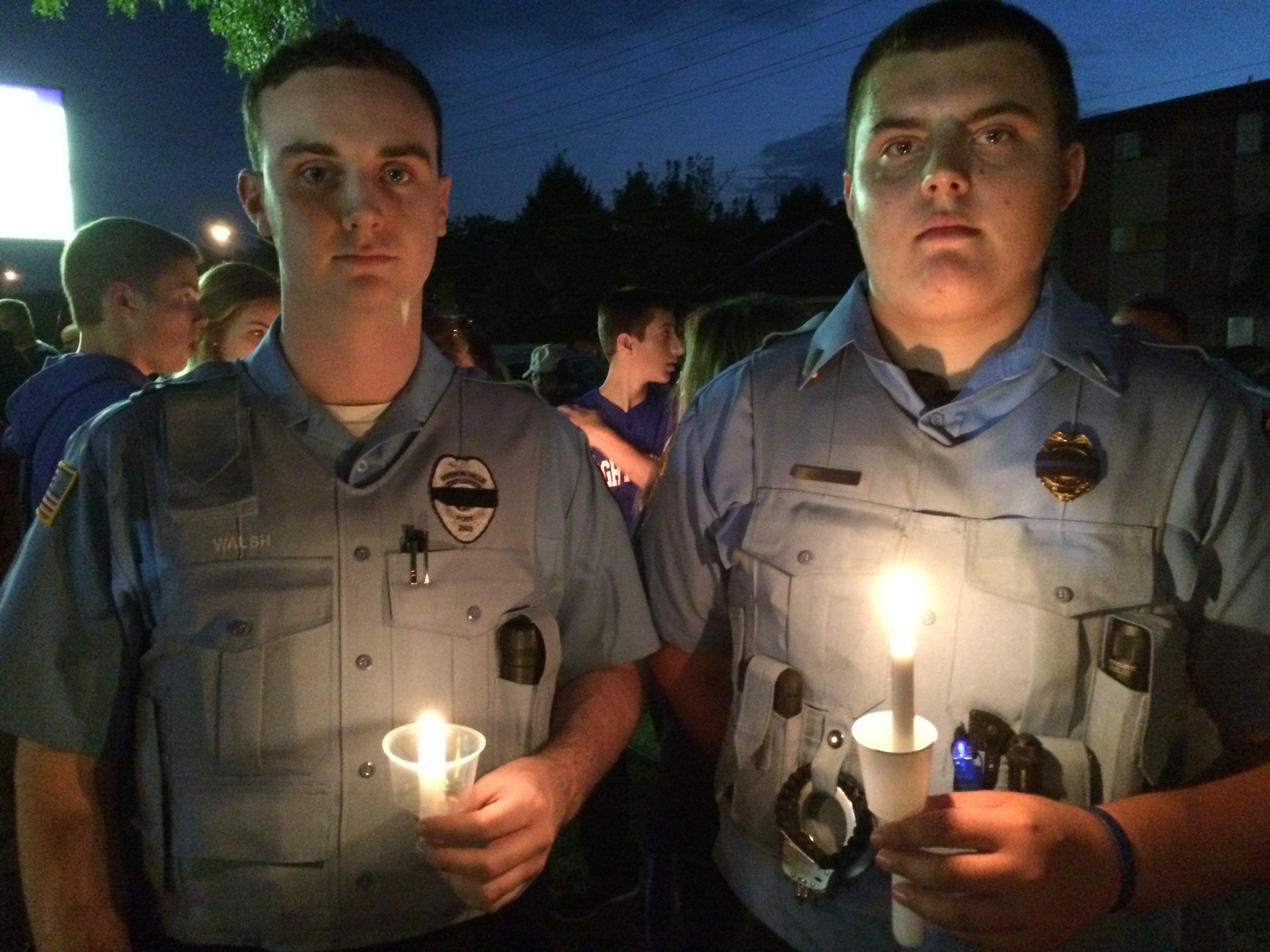 Residents and fellow police officers gather at the Fox Lake, Illinois Police Department on September 2, 2015, to remember the life of Lt. Joe Gliniewicz. Gliniewicz was shot and killed on Tuesday while chasing three suspects.