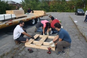 Students work to build basking platforms that will improve habitat for painted turtles at Kyle Lake in Jefferson County. (Provided photo)