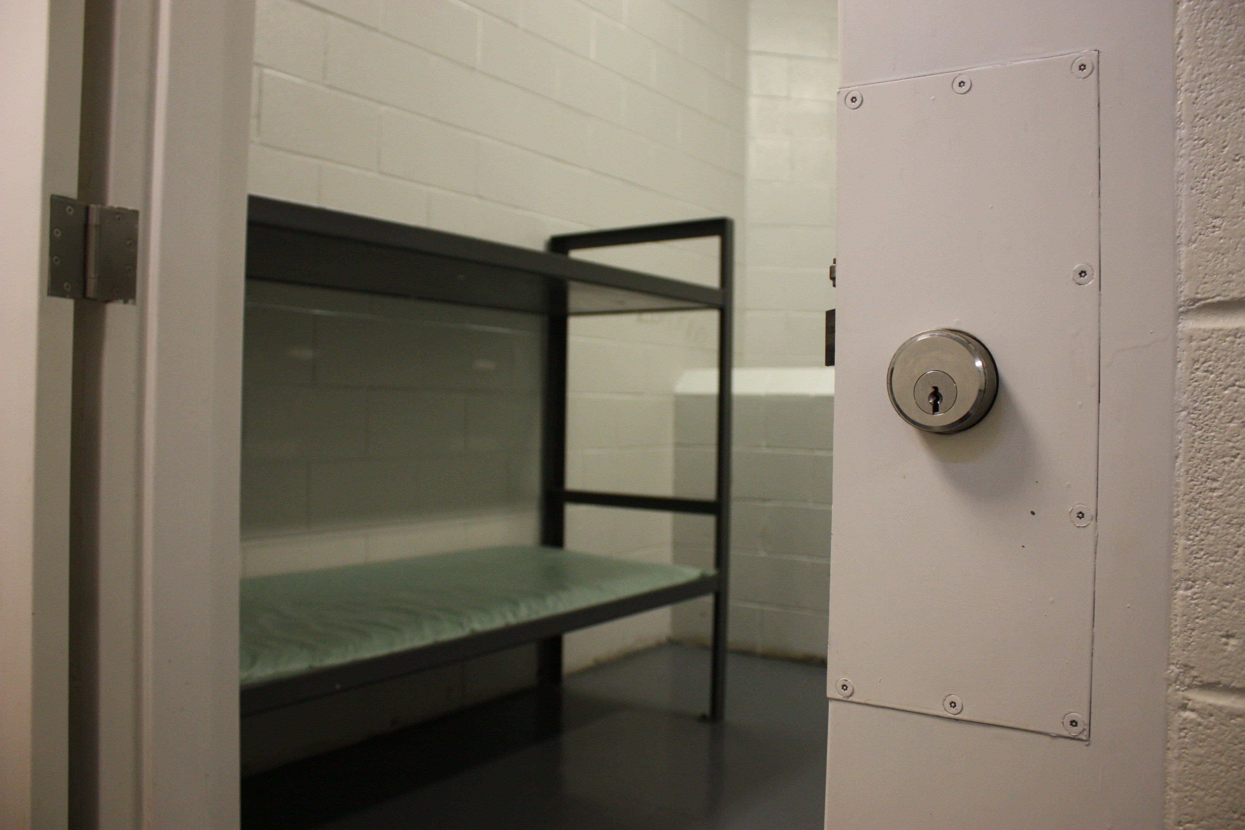 Shots of empty jail cell, prison