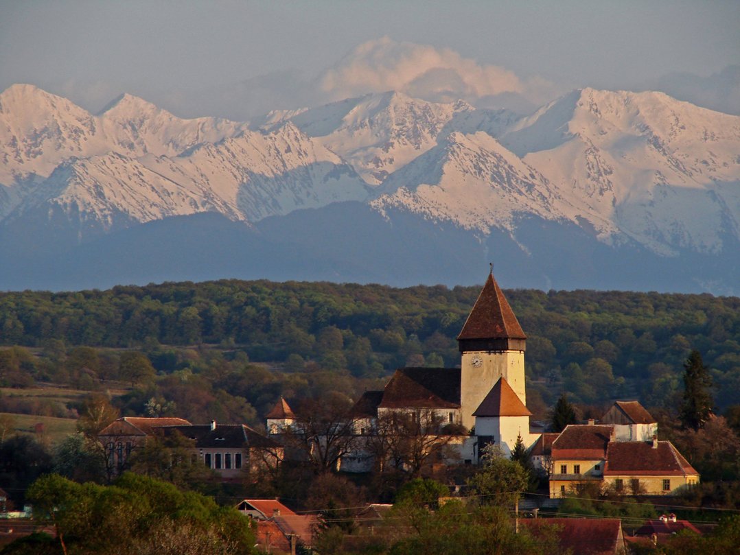 Authentic medieval architecture dating back to the 13th century can be found in Romania's Carpathian Villages of Transylvania in the Transylvanian Alps. The town of Hosman is shown here.