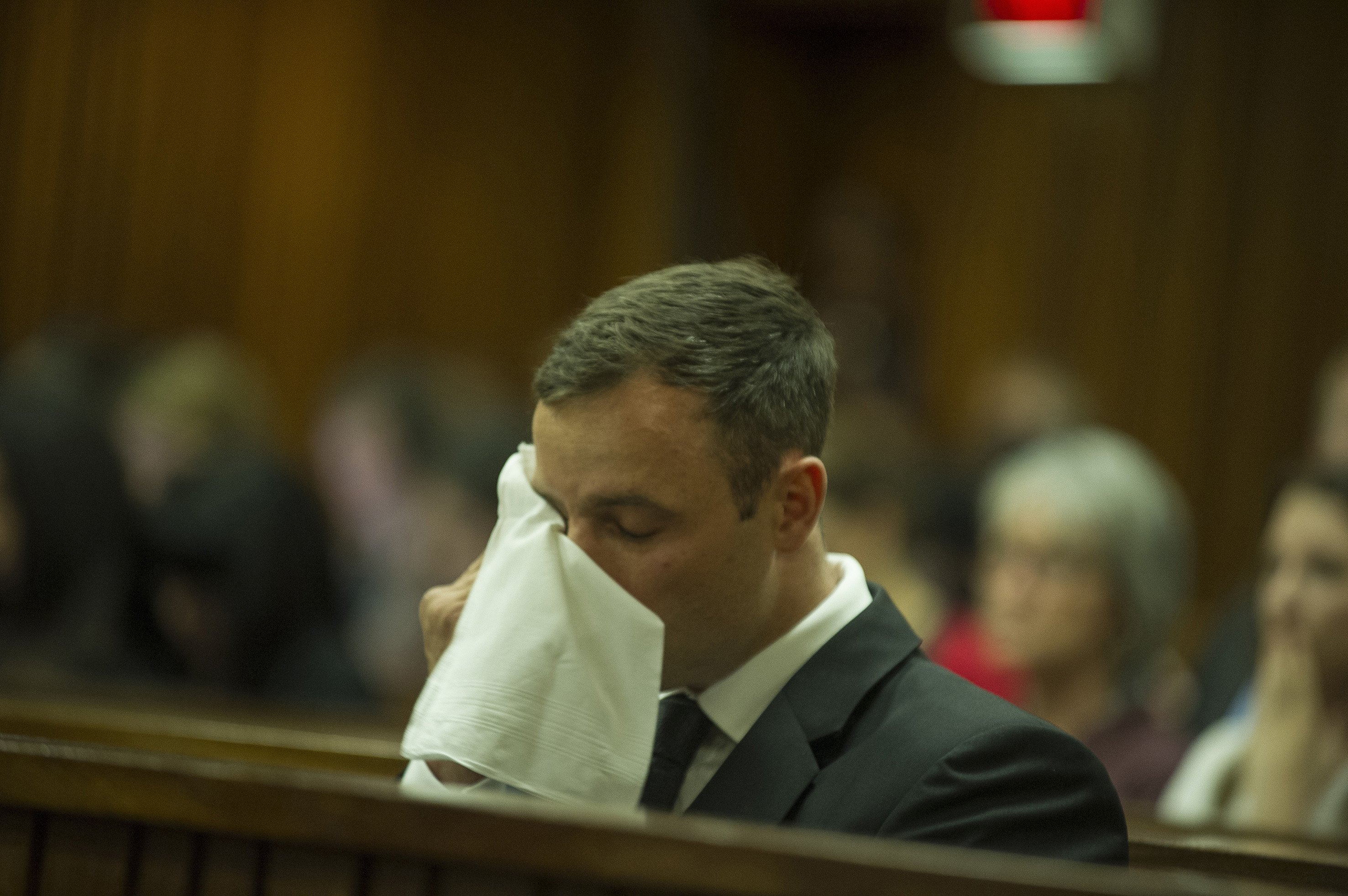 Paralympian Oscar Pistorius is seen crying during final arguments in sentencing at the high court in Pretoria, Friday, October 17, 2014.